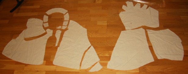 Løse deler til hettekappen, gruppert i front- og bakstykke